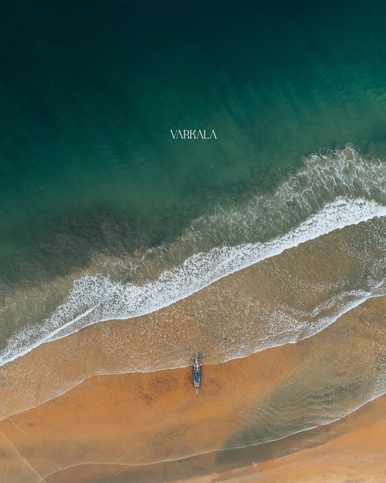 Aerial view of the cliffside beach at Varkala, Kerala